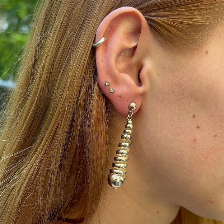 Finden Sie Ohrringe, Ohrstecker konisch spiralförmig, versilbertes und vergoldetes Messing in unserer großen Auswahl an Ohrringen bei Beadhouse von Kopenhagen heute. Denken Sie daran, dass der Versand ab 400 DKK kostenlos ist