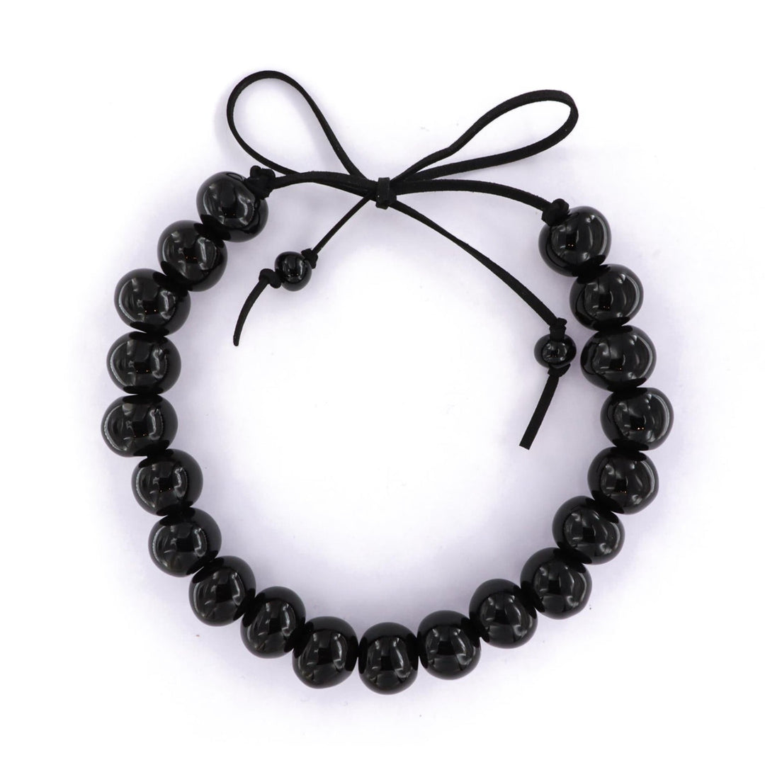 Halskæde, keramik perler på ruskindssnor, justerbar, flere varianter BOC