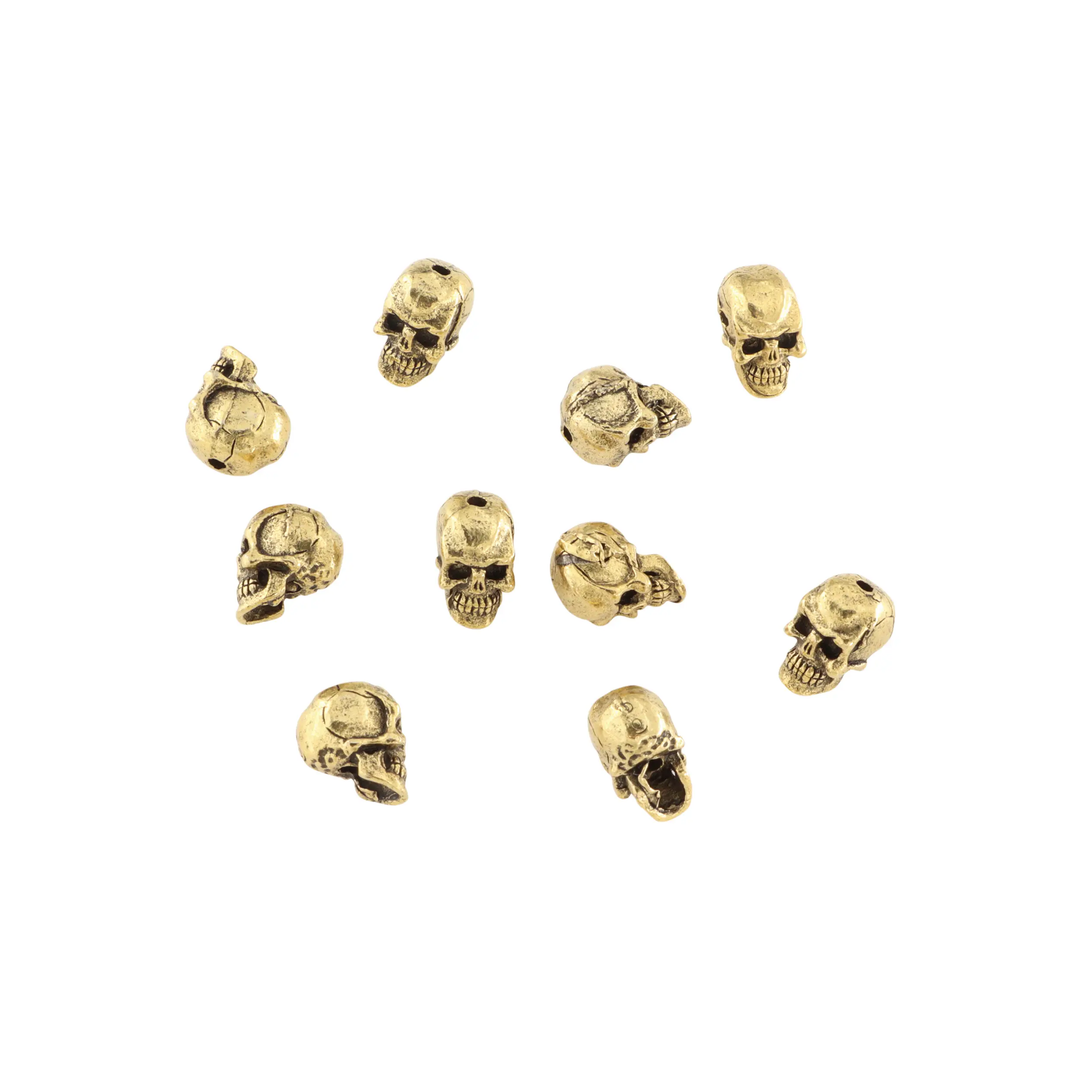 Metalperler, dødningehoved, forgyldt messing, 10x8 mm. BOC