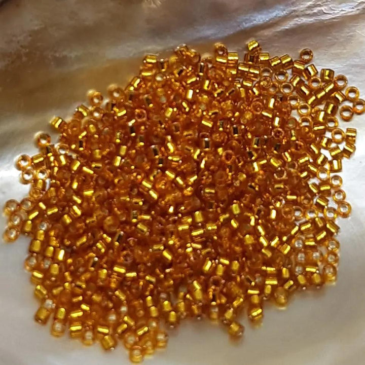 Guld glasperler, miyuki delica beads, duracoat silverlined dyed yellow Krea